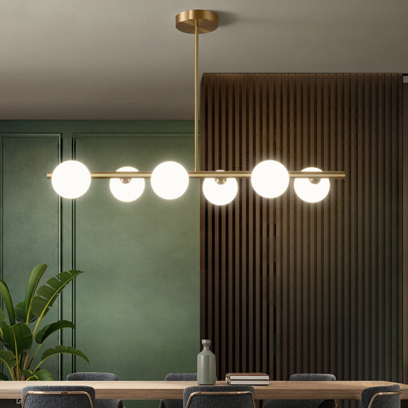 Gold Linear Island Pendant Light With Spherical Glass Shade - Perfect For Dining Table And