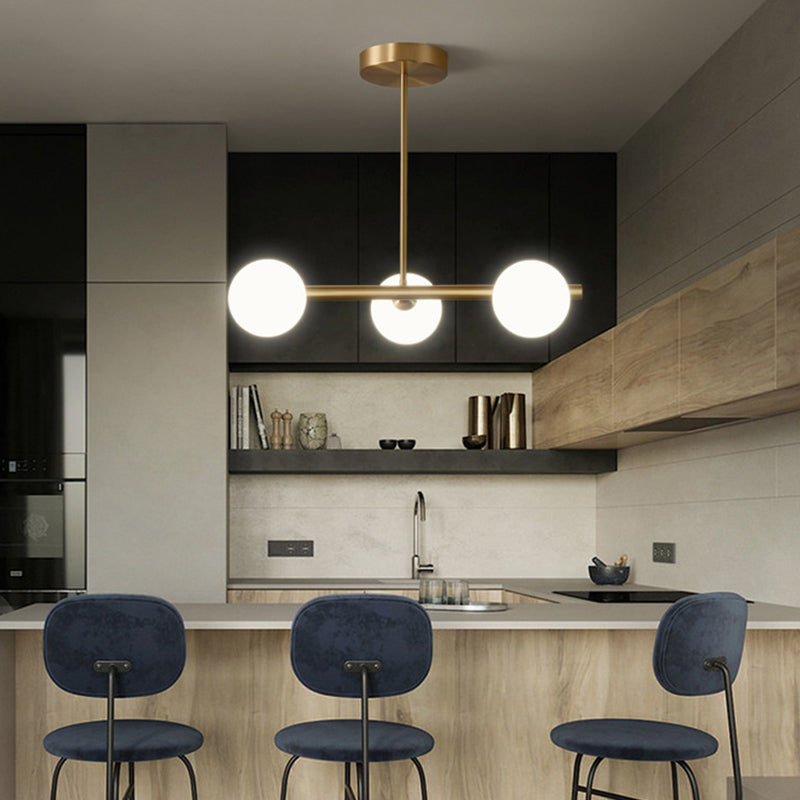 Gold Linear Island Pendant Light With Spherical Glass Shade - Perfect For Dining Table And